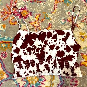 Very cute cow print crop top. Size medium